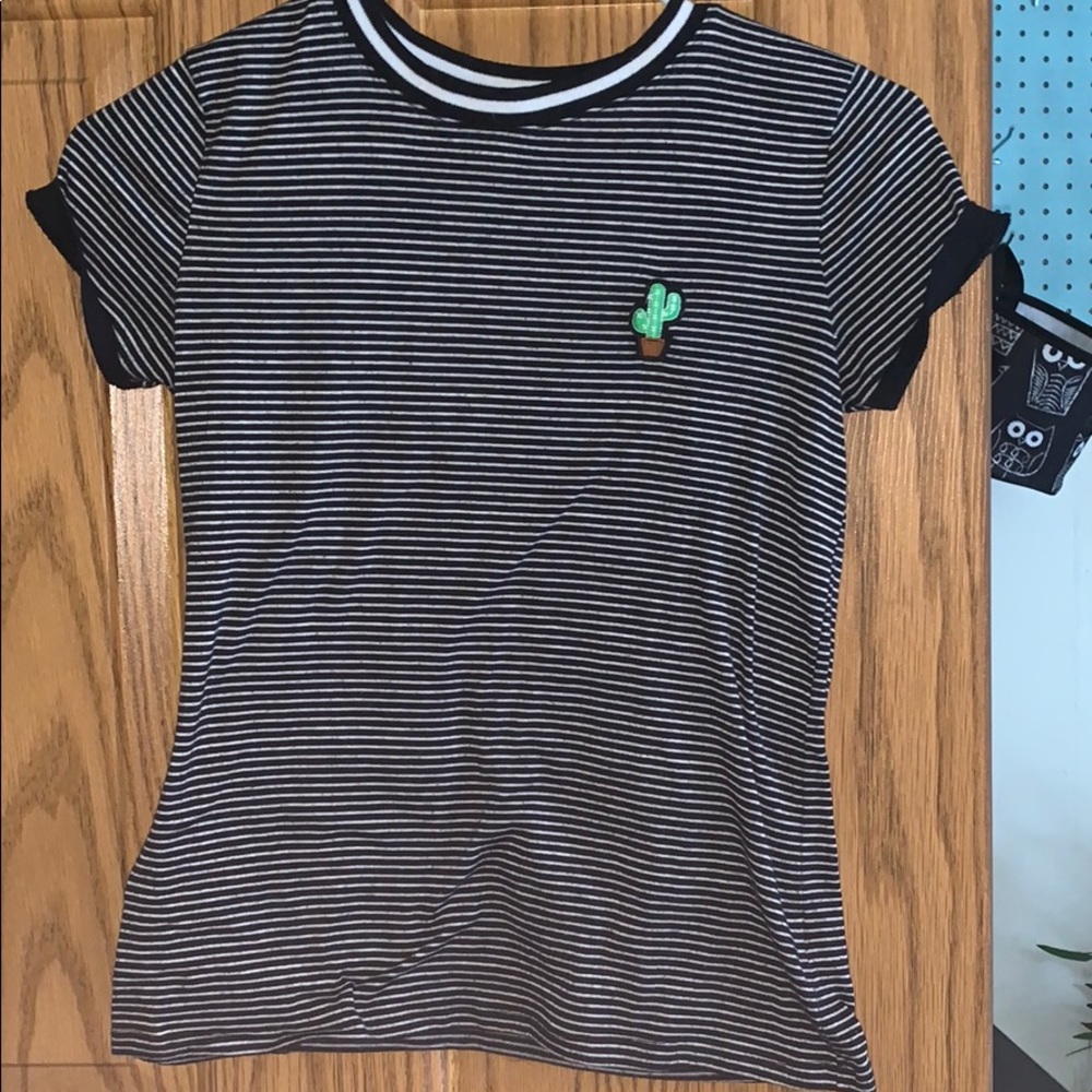 So striped shirt with cactus on top left side